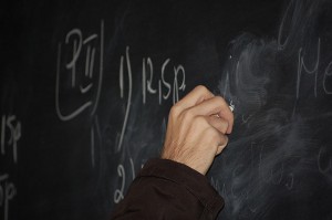 Hand Writing on Blackboard